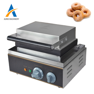 Il creatore commerciale della ciambella della placca a pressione lavora le ciambelle a macchina multiple automatiche